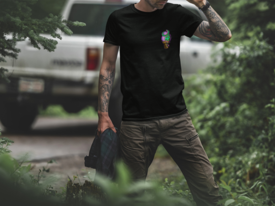 Man wearing a Nudge Theory Shirt in the woods