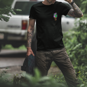 Man wearing a Nudge Theory Shirt in the woods
